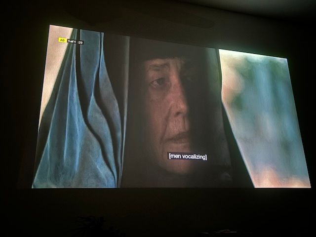 An older woman in black habit, a Bene Gesserit. In the corner, ad 1 of 1 :29
